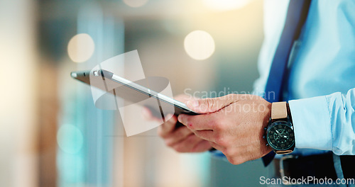 Image of Business man browsing on a digital tablet in an office. Closeup on hands of a corporate professional and expert staying organized with apps. Scrolling on the internet and planning successful ideas