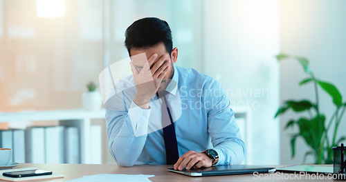 Image of Stressed Sales manager is angry about a bad sales report after a marketing campaign. Frustrated executive is upset and annoyed about advertising problem and is under real pressure to hit his deadline