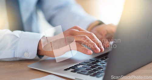 Image of Lawyer sending emails on a laptop while working in a modern office. Closeup of advocate or legal assistant researching online. Searching for information while preparing for a case