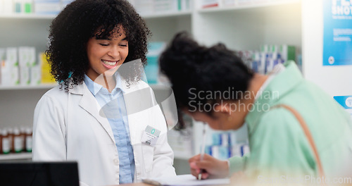 Image of Pharmacist helping a customer in a pharmacy. Woman signing medical paperwork to collect over the counter and prescription medication from a friendly healthcare worker in a chemist or dispensary