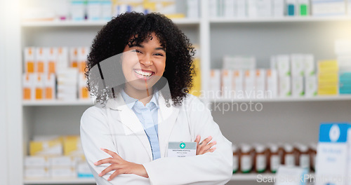 Image of Medical Professional working at chemist ready to give great healthcare customer service to sick patients. Happy female nurse happy to help people get medicine treatment at her pharmacy retail store