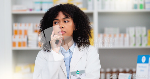 Image of Medical Professional working at chemist ready to give great healthcare customer service to sick patients. Happy female nurse happy to help people get medicine treatment at her pharmacy retail store