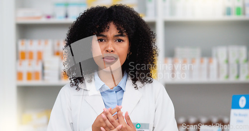 Image of Friendly female chemist explaining the benefits of medicine. African American woman pharmacist listening to the symptoms of the customer. Health worker recommending a specific product to the client