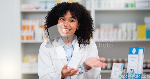 Image of Friendly female chemist explaining the benefits of medicine. African American woman pharmacist listening to the symptoms of the customer. Health worker recommending a specific product to the client