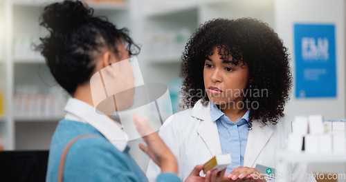 Image of Happy pharmacy woman consultant helping customer with her prescription. Female pharmacist giving instructions to her client in more detail. Understanding customer listening to professional.