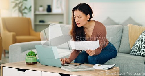 Image of Woman, paper and laptop in living room on sofa working on project, assignment or task for college or business. Student, girl and home to study, for test or exam at university with handheld movement