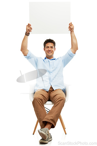 Image of Endorsing your company in comfort. A handsome young man holding up copyspace.