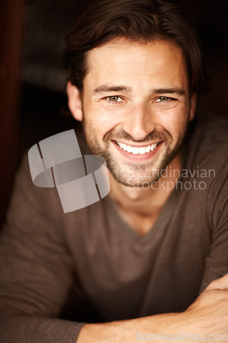 Image of Hansome and happy with life. Portrait of a handsome young man smiling.