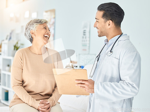 Image of Consulting, funny and results with old woman and doctor for medical, surgery and life insurance. Medicine, healthcare and report with man and senior patient in hospital for help, exam and checklist