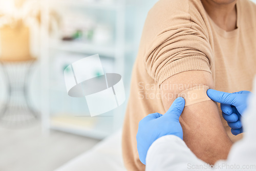 Image of Bandaid, vaccine and patient with doctor for healthcare, first aid bandage or medical consultation for covid injection. Hands, hospital nurse and plaster for an injury, virus or injection in arm