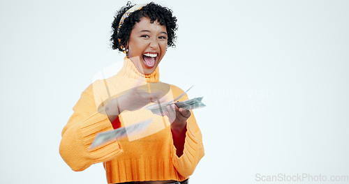 Image of Woman, excited and cash, finance and wealth, prize or reward in portrait isolated on white background. Winner, celebrate and bonus, money and dollar bills with happiness, financial freedom in studio