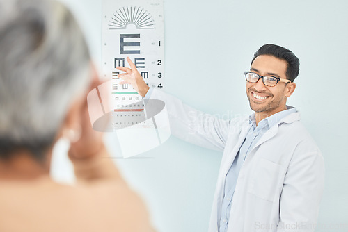 Image of Vision, test for eyes and reading chart, optometrist and patient, healthcare and alphabet at clinic. Eye care, glasses and diagnosis with assessment, health and wellness, people with trust and help