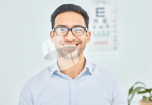 Image of Man, face or glasses for vision, eye exam or optometry in clinic wellness, health or prescription frames. Happy, person, portrait or Mexican patient in optician, ophthalmology and eyesight assessment