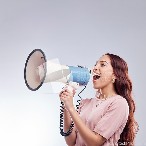 Image of Discount, megaphone or woman shouting an announcement, speech or sale on white background. Attention, voice or girl with news or broadcast of opinion on mock up space talking on mic speaker in studio