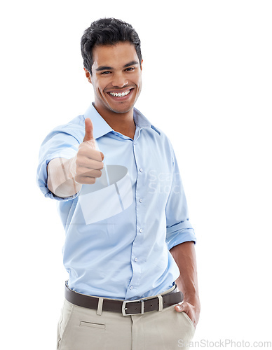 Image of An enthusiastic approval. Studio shot of a young man giving the thumbs up sign isolated on white.