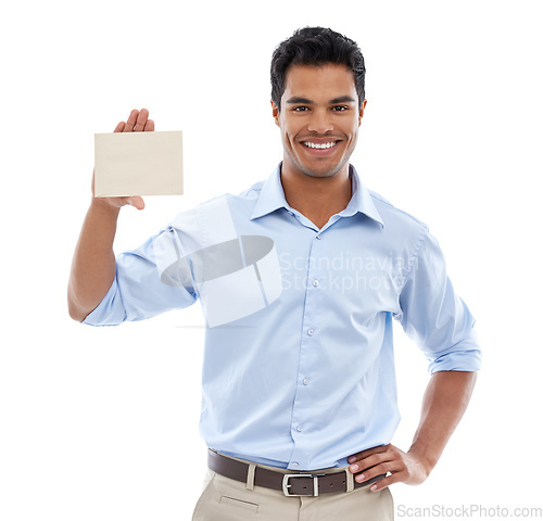 Image of How do you like this idea. Studio shot of a young man holding a blank card for copyspace isolated on white.