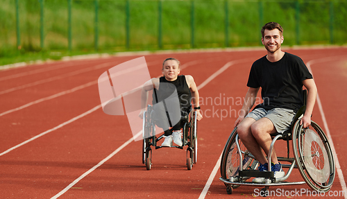 Image of An inspiring couple with disability showcase their incredible determination and strength as they train together for the Paralympics pushing their wheelchairs in marathon track