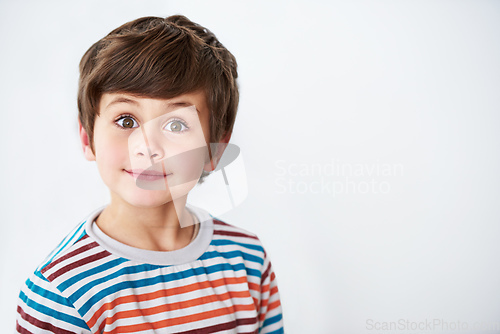 Image of Stop staring now. Shot of a cute little boy looking at the camera.