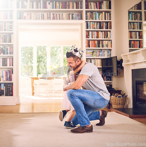 Image of Daddy loves you with his whole heart. Shot of a father hugging his little daughter at home.