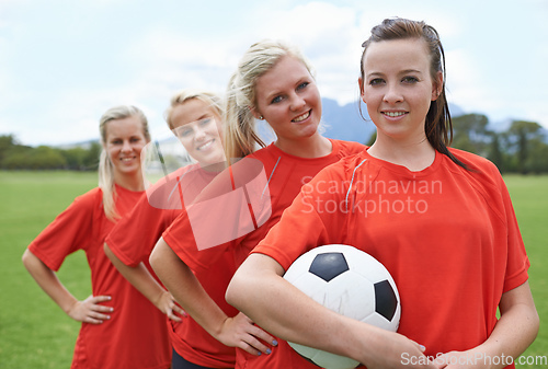 Image of Together theyll win. Portrait of a young female soccer player and her teammates.