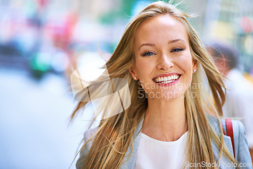 Image of Taking in the big city. A beautiful young woman on the streets of New York.