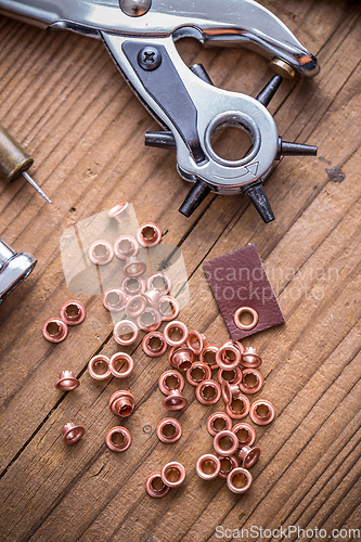 Image of Punch tool with eyelet rings