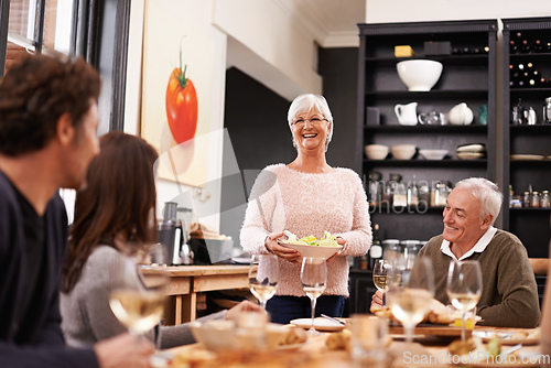 Image of Friends and family are the true gifts in life. Shot of a family sitting down to dinner.