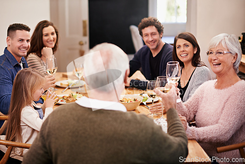 Image of Id like to say a few words.... Cropped shot of a family sitting down to dinner.