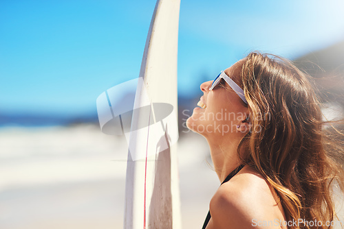 Image of I dont see a shrink, I see waves. Shot of a young surfer at the beach.