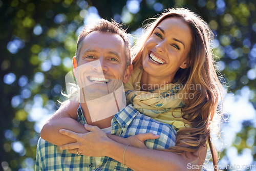 Image of Were so in love. Portrait of an affectionate couple outside in the summer sun.