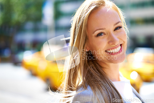 Image of Concrete jungle jet setter. A cropped shot of a beautiful woman walking around the city in the day time.