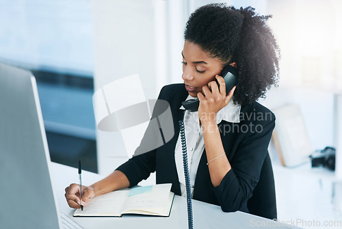 Image of Im calling to confirm our meeting for tomorrow.... Shot of a young businesswoman talking on a telephone in an office.