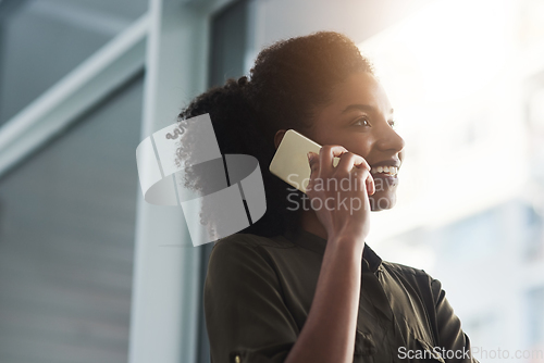 Image of New ideas and trends shared prompt and easily. Close up shot of a young businesswoman making a phone call in her office.