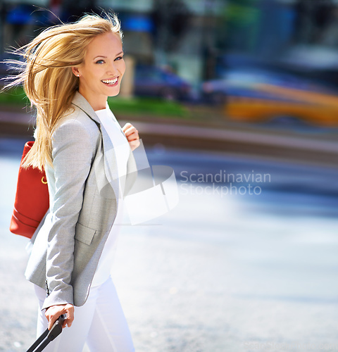 Image of Have you found your inner jet setter. A portrait of a gorgeous woman with her luggage in New York.