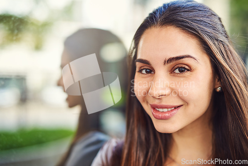 Image of Her aspirations has always been business orientated. Portrait of a beautiful young businesswoman outside.