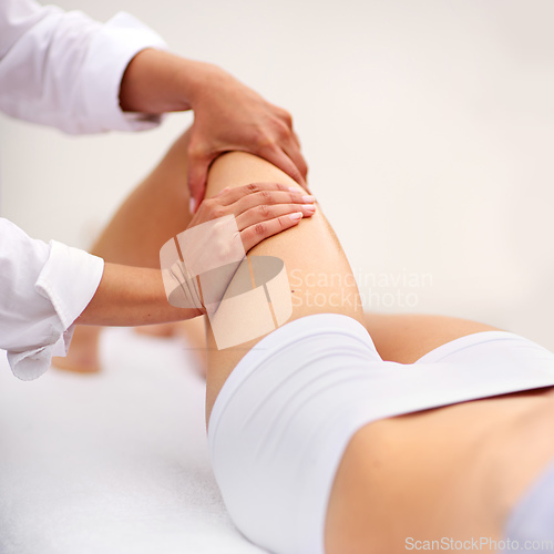 Image of Getting rid of tense muscles. Cropped shot of a woman enjyoing a massage at the day spa.