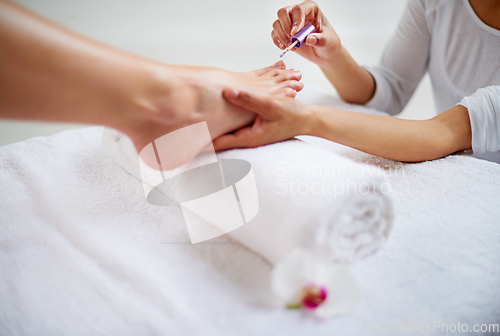 Image of Relaxing pedicure. Closeup shot of a woman getting a pedicure in a health spa.