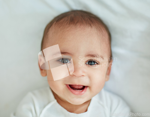 Image of Cute doesnt get any cuter than this. Shot of an adorable baby boy at home.