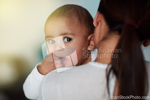 Image of Hold my calls until Im done bonding with Mom. Shot of a loving mother carrying her baby boy at home.