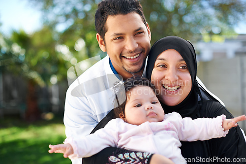 Image of Were a blessed family. Portrait of a muslim family enjoying a day outside.