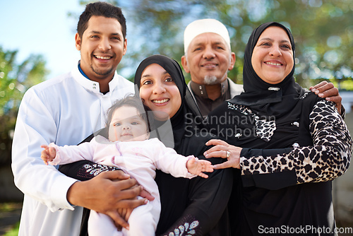 Image of One big happy family. A muslim family enjoying a day outside.