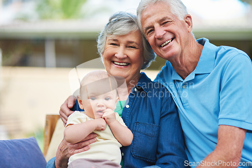 Image of Grandsons make life special. Cropped shot of a senior couple spending time with their grandson.