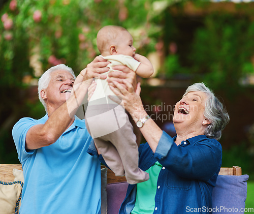 Image of Thank heaven for little boys. Cropped shot of a senior couple spending time with their grandson.