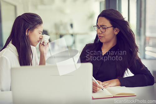 Image of I couldnt hold it in anymore. Cropped shot of a businesswoman sneezing in her colleagues face in an office.