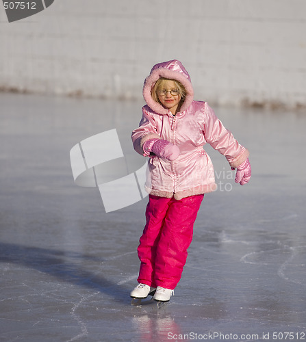 Image of Child in Pink Ice Skating