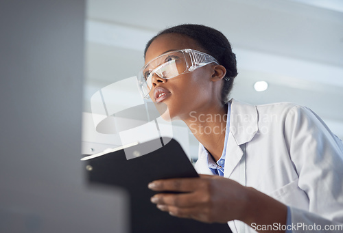 Image of Every contribution is a contribution that matters. Shot of a young scientist using a computer while conducting research in a laboratory.