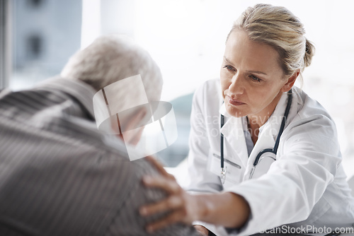 Image of Well get through this. Cropped shot of a mature female doctor working with a senior male patient in her office in the hospital.