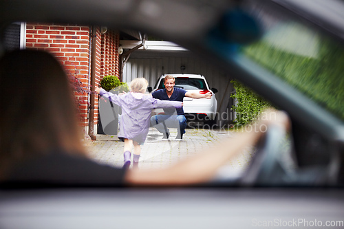 Image of Shes happy to be home. Shot of a little girl running towards her father.