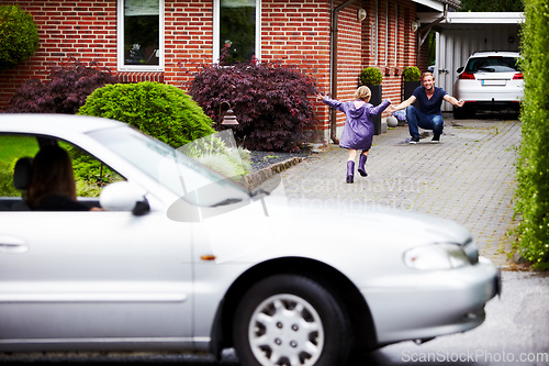 Image of Shes happy to be home. Shot of a little girl running towards her father.