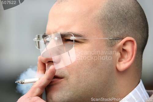 Image of smoking man